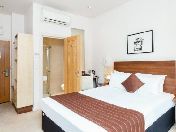 Get a good night's sleep in your comfortable room at Avni Kensington Hotel