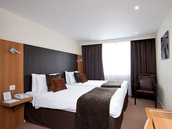A typical triple room at The Re Hotel London Shoreditch