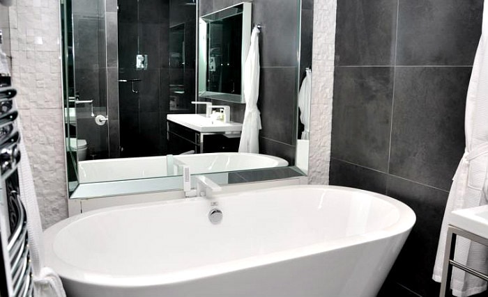 Relax in the private bathroom in your room