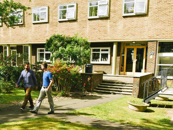 The attractive gardens and exterior