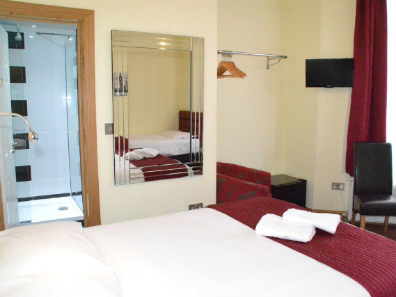 A twin room at Hotel 65 London is perfect for two guests