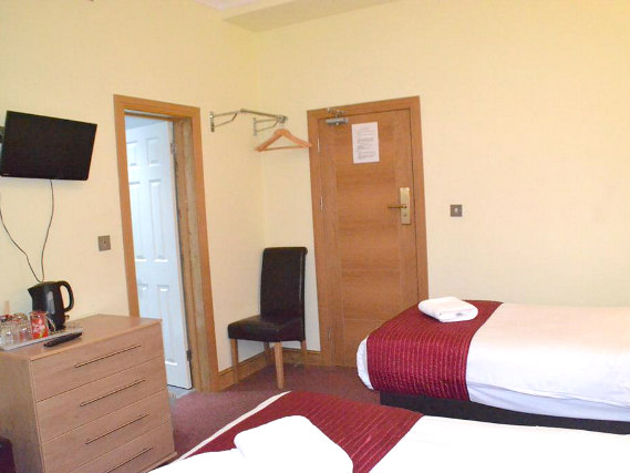 A twin room at Hotel 65 London is perfect for two guests