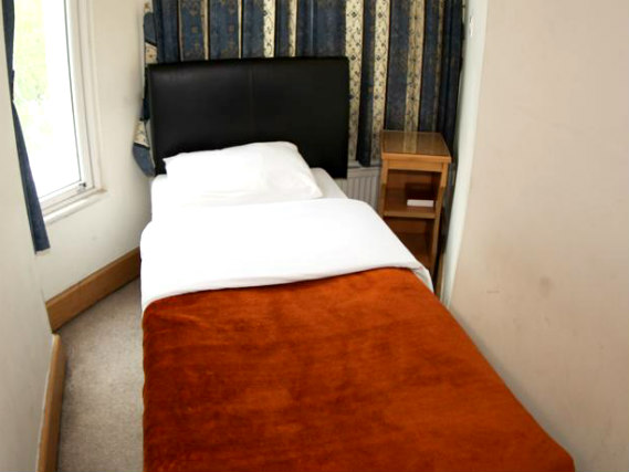 Ein Einzelzimmer im Holland Inn Hotel