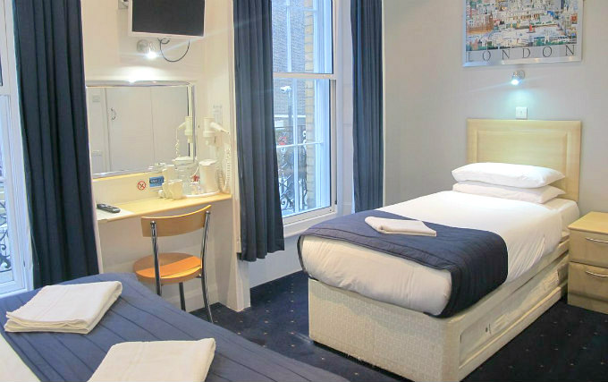 A typical triple room at Alhambra Hotel