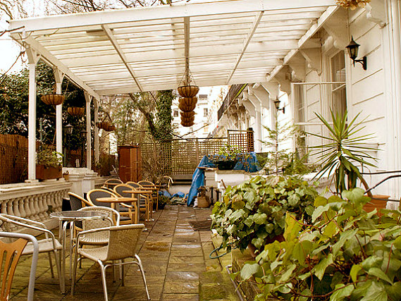 Relax in the garden at Pembridge Palace Hotel London