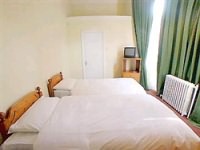 A Triple room at Chelsea House Hotel