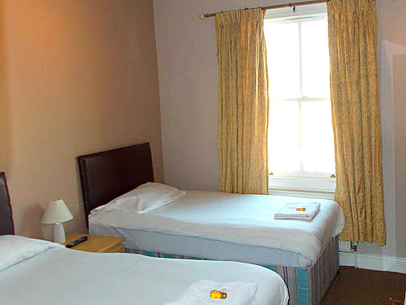 Habitación doble con camas separadas en City Stay Hotel London