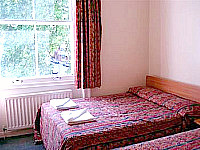 A typical triple room at Palace Court Hotel