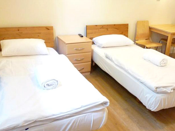A twin room at Earls Court Studios
