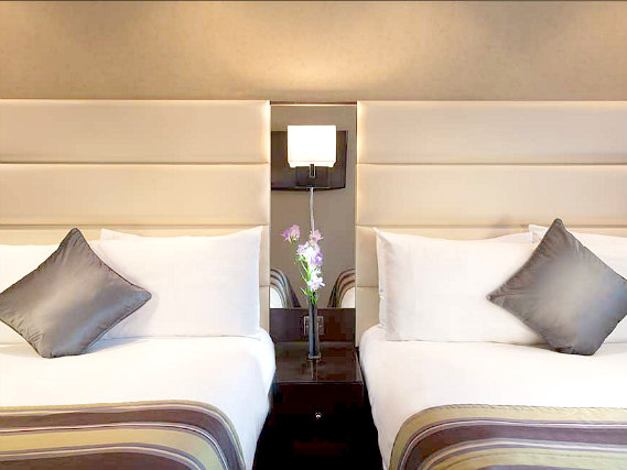 A twin room at Shaftesbury Premier London Hyde Park Hotel is perfect for two guests