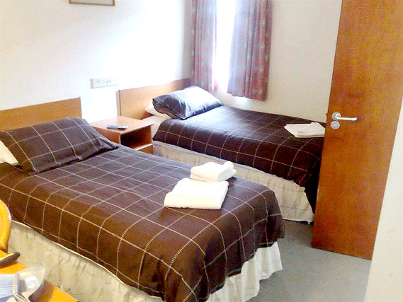A twin room at Shepiston Lodge Heathrow is perfect for two guests