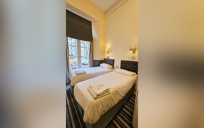 A twin room at Hyde Park Court Hotel