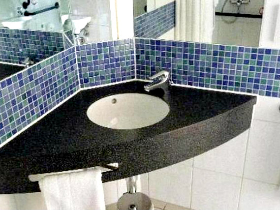 Relax in the private bathroom in your room