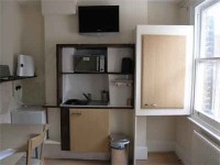 The kitchenette in the standard studio