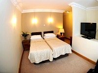 A Typical twin room at Kings Cross Inn Hotel