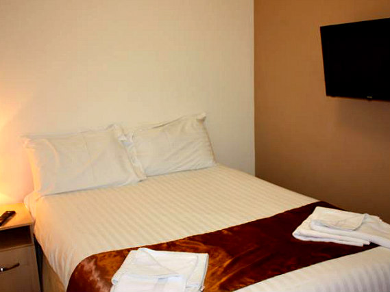 Put your feet up in front of the TV in your room