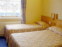 A typical twin room at Orchard Hotel