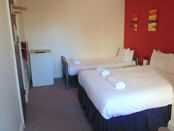 Une chambre triple de Travel Inn London