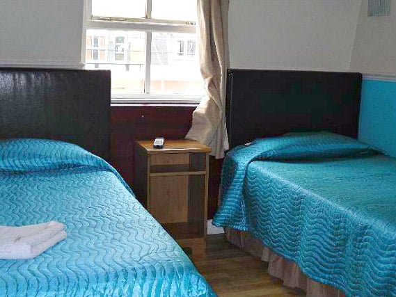 A twin room at Linden House Hotel is perfect for two guests