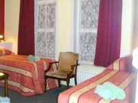 A typical triple room at Chelsea Lodge Hotel