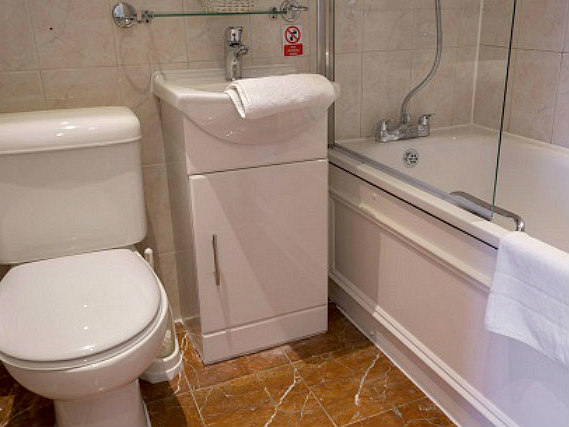 Relax in the private bathroom in your room