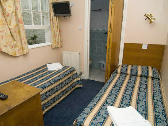 Une chambre avec lits jumeaux de Normandie Hotel London
