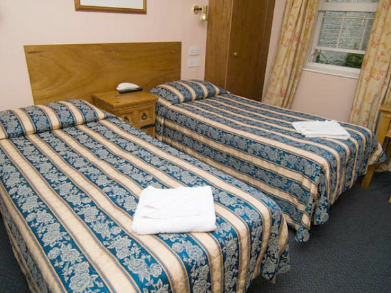 Une chambre avec lits jumeaux de Normandie Hotel London