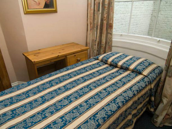 Une chambre simple à Normandie Hotel London