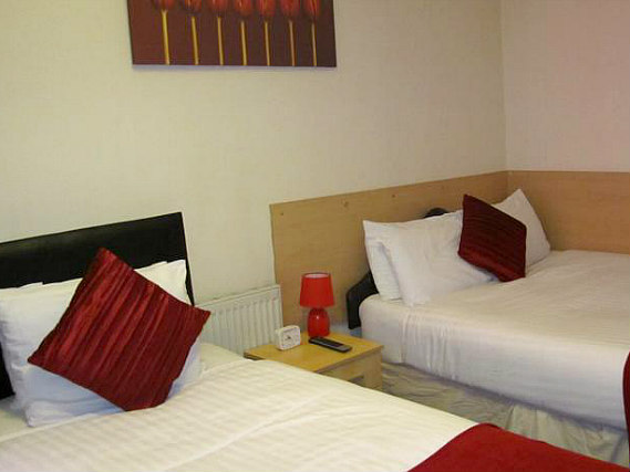 Une chambre avec lits jumeaux de Twickenham Guest House