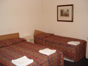 A typical triple room at Palace Court Hotel