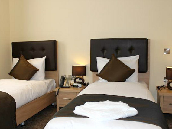 Une chambre avec lits jumeaux de Shoreditch Inn