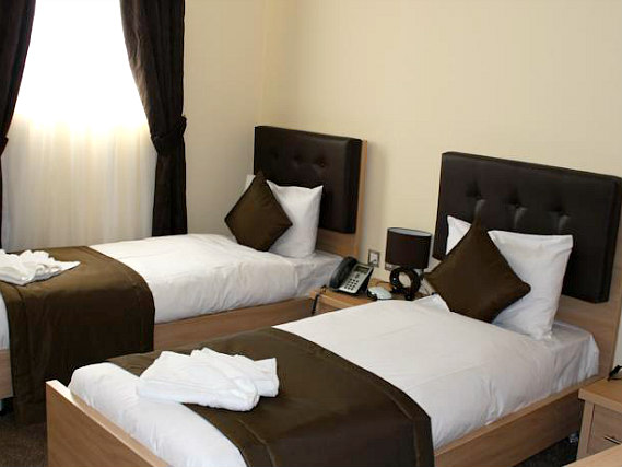 Une chambre avec lits jumeaux de Shoreditch Inn