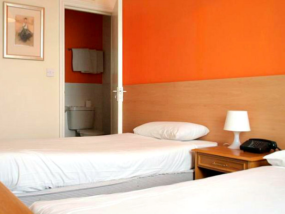 Une chambre avec lits jumeaux de Clapham South Dudley Hotel