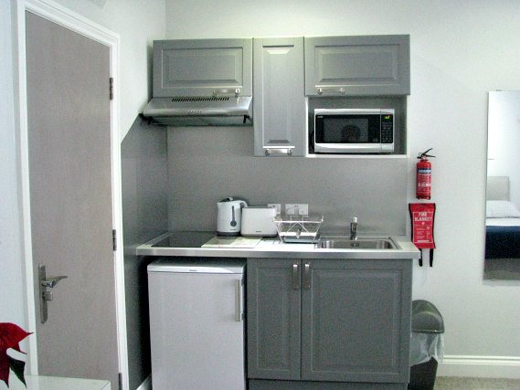 A clean and bright kitchen for you to prepare food