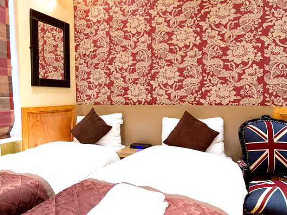 Une chambre avec lits jumeaux de Excelsior Hotel