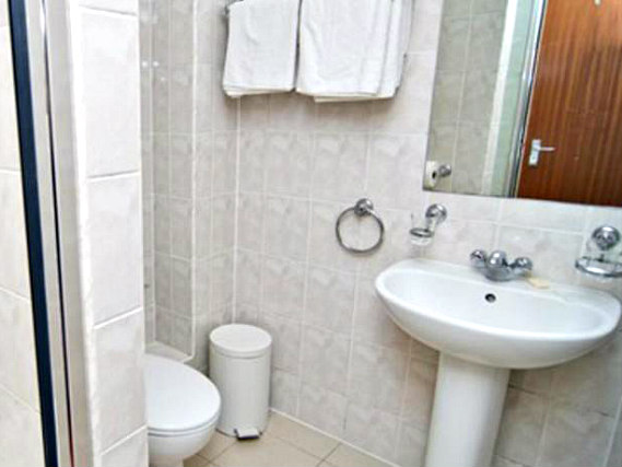 Relax in the private bathroom in your room