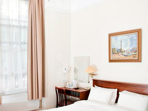 Put your feet up in front of the TV in your room