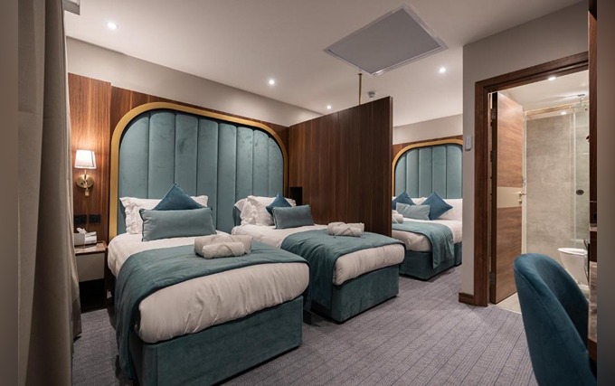 A comfortable Quad room at St Mark Hotel London