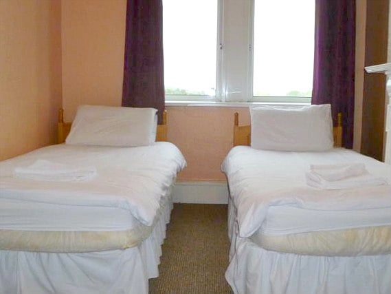 A twin room at Antigallican Hotel