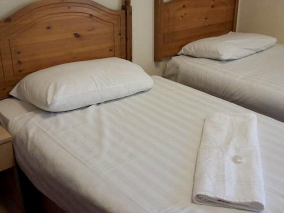Une chambre avec lits jumeaux de Hotel Olympia