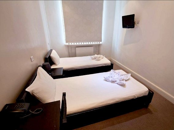 Une chambre avec lits jumeaux de Hotel 43 London