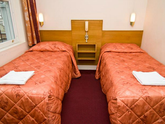 Put your feet up in front of the TV in your room