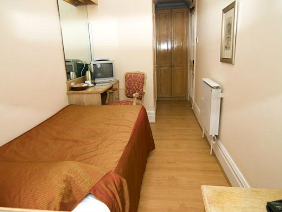 Put your feet up in front of the TV in your room