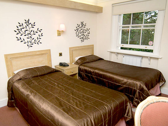 A twin room at Gresham Hotel is perfect for two guests