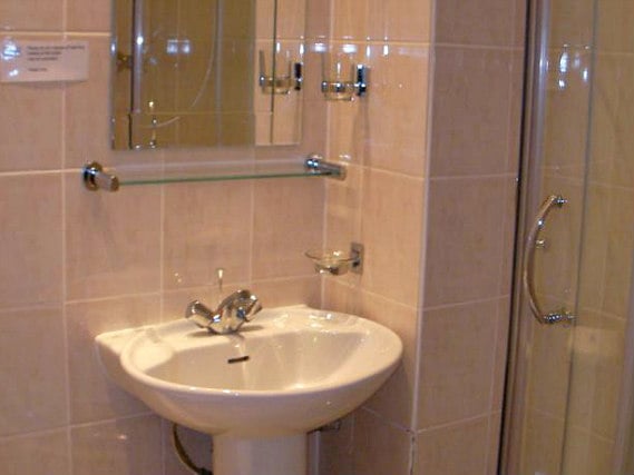 Relax in the private bathroom in your room