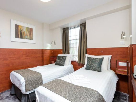 Une chambre avec lits jumeaux de Wardonia Hotel