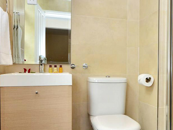 Relax in the private bathroom in your room