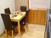 Eat dinner in the attractive Dining area of your studio at the Lancaster Gate Superior Apartments