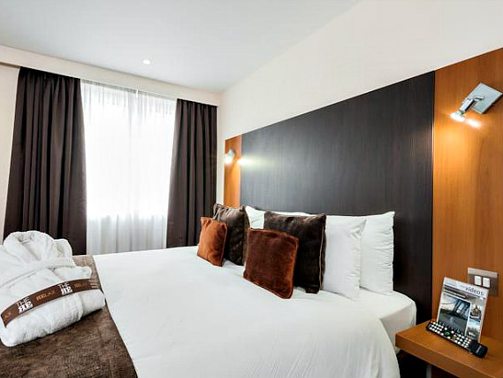 Rest easy in a comfortable bed in your room