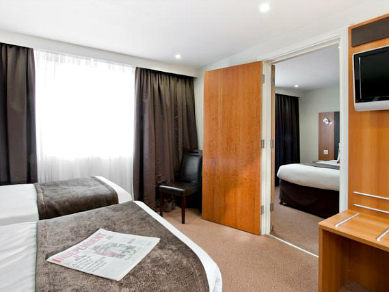 Put your feet up in front of the TV in your room